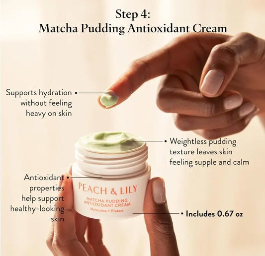 Hand holding Peach & Lily Matcha Pudding Antioxidant Cream jar with green cream on fingertip, highlighting hydration and antioxidant benefits
