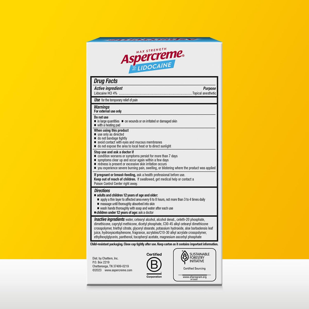 Back of a box of Aspercreme with drug facts and warnings on a yellow background