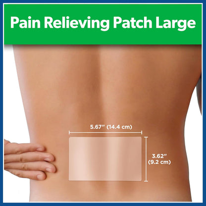 Large pain relieving patch on a person's back with measurements displayed.