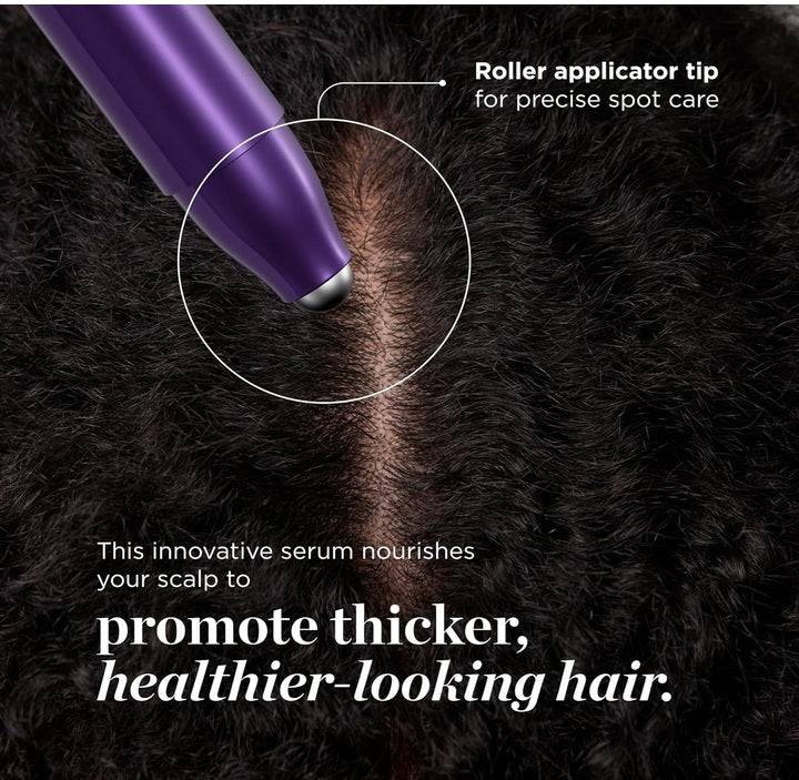 Purple roller applicator tip applying serum to scalp with thick, healthy hair for precise spot care